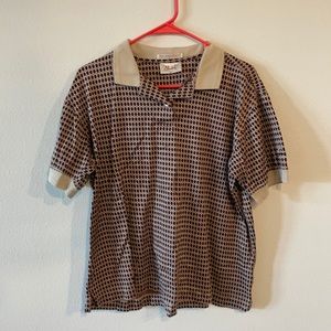 Red & cream patterned two-button polo. Embossed collar & sleeves.